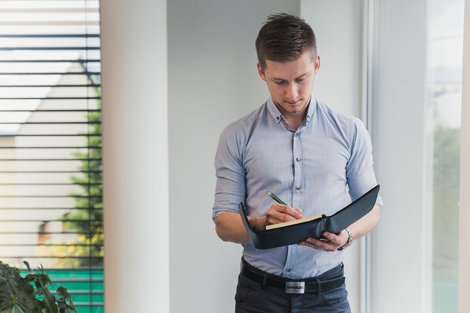 Man reading notes